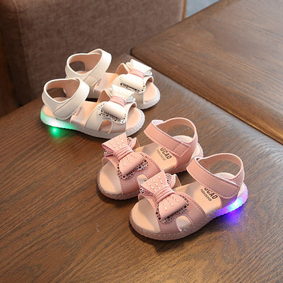 Детски светещи сандали в бял и розов цвят с панделка