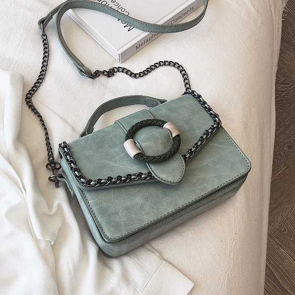 Geanta de dama moderna cu element metalic in mai multe culori