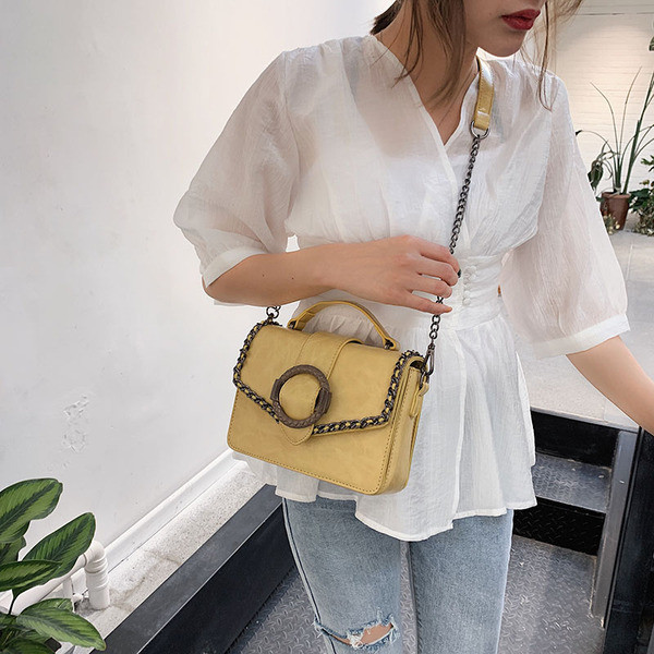 Geanta de dama moderna cu element metalic in mai multe culori