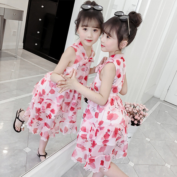 Rochie elegantă pentru copii pentru fete în două culori - galben și roșu cu o panglică