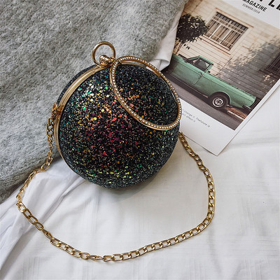 Geanta de dama eleganta in forma rotunda cu maner lung si scurt