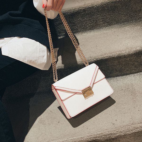 Geanta de dama eleganta cu decor metalic in mai multe culori