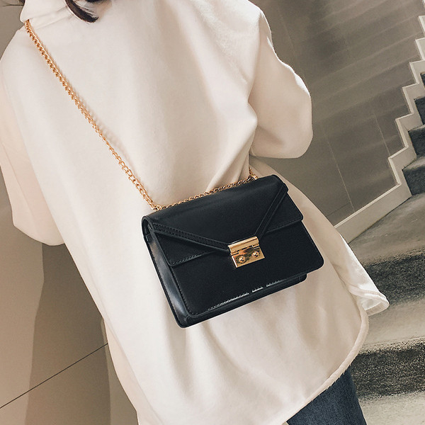 Geanta de dama eleganta cu decor metalic in mai multe culori