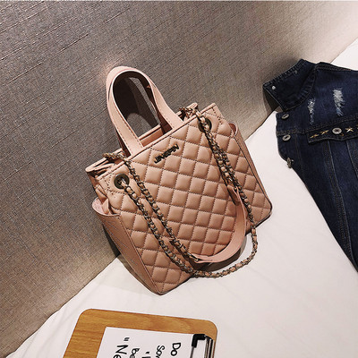 Geanta de dama din piele cu maner metalic