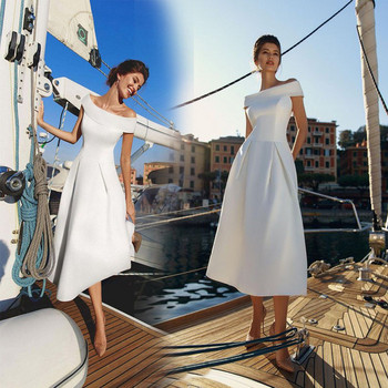 Rochie elegantă de damă cu umerii goi, în alb