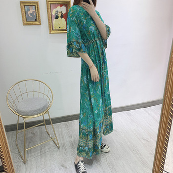 Rochie lunga de dama cu maneci 3/4 si talie elastica de culoare verde cu model