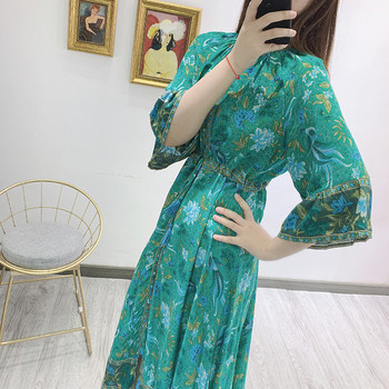 Rochie lunga de dama cu maneci 3/4 si talie elastica de culoare verde cu model