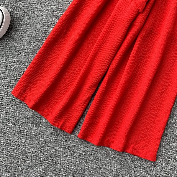 Κορυφαίες γυναικείες ολόσωμες φόρμες με φαρδιές λωρίδες και κορδέλα σε μαύρο και κόκκινο χρώμα