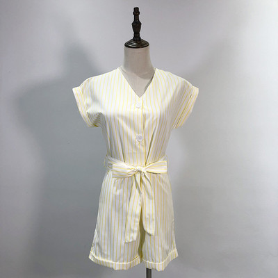 Γυναικεία ολόσωμη φόρμα με ζώνη μέσης και κουμπιά