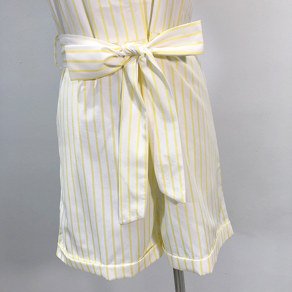 Γυναικεία ολόσωμη φόρμα με ζώνη μέσης και κουμπιά