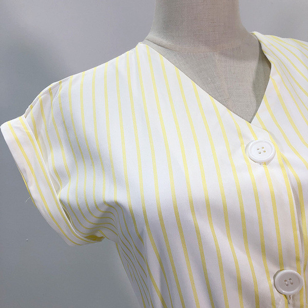 Γυναικεία ολόσωμη φόρμα με ζώνη μέσης και κουμπιά