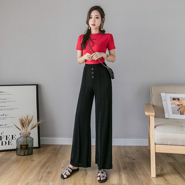 Pantaloni de dama la moda in negru cu nasturi