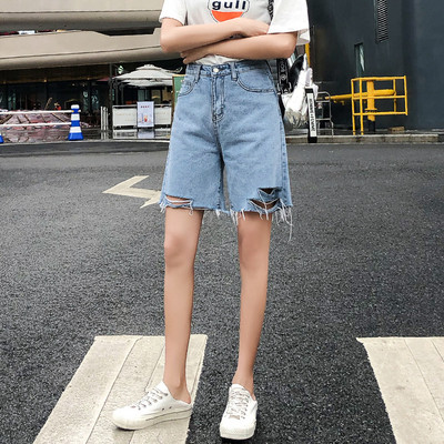 Pantaloni scurți de damă din denim actual cu motive rupte în albastru