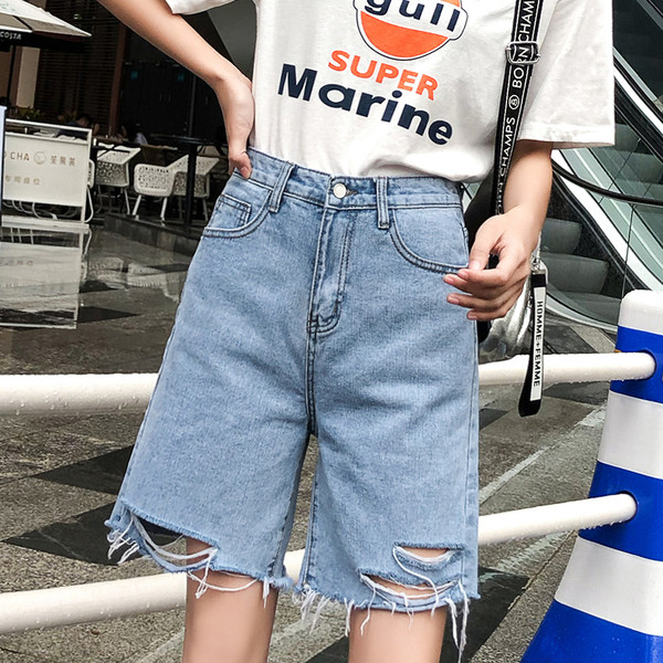 Pantaloni scurți de damă din denim actual cu motive rupte în albastru