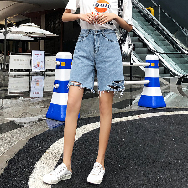 Pantaloni scurți de damă din denim actual cu motive rupte în albastru