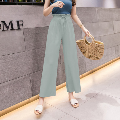 Pantaloni de dama actuali cu cravate in verde