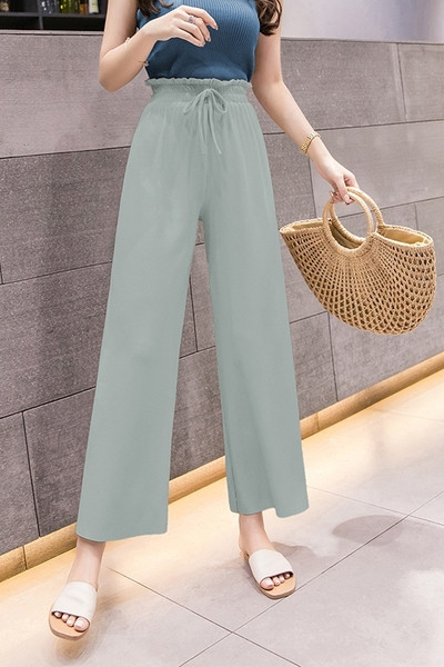 Pantaloni de dama actuali cu cravate in verde