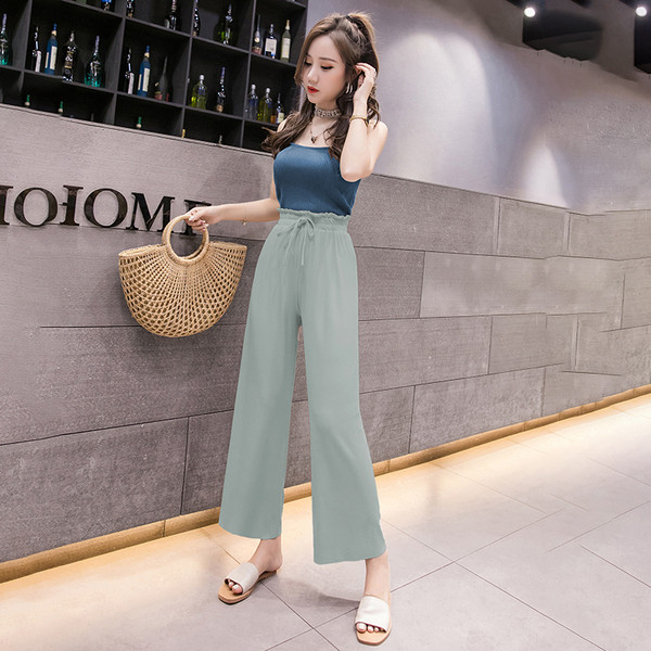 Pantaloni de dama actuali cu cravate in verde