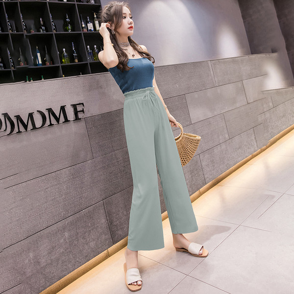 Pantaloni de dama actuali cu cravate in verde