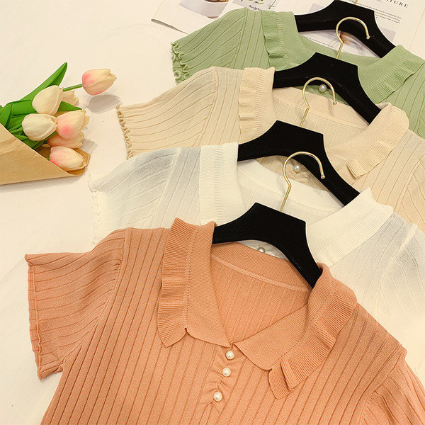 Bluză de damă cu mâneci scurte și nasturi