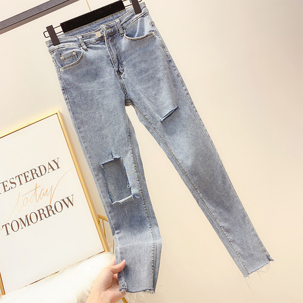 Blugi lungi de damă cu motiv rupt în albastru