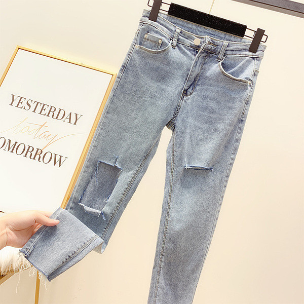 Blugi lungi de damă cu motiv rupt în albastru