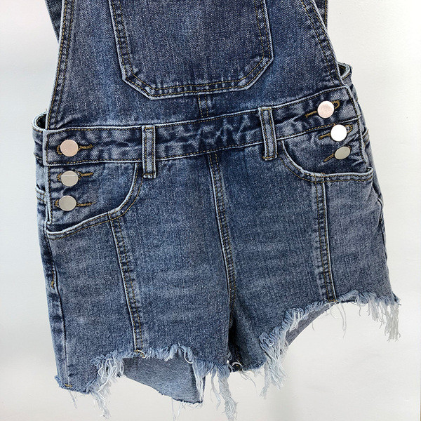 Γυναικεία ολόσωμη φόρμα με κουμπιά και σχισμένο μοτίβο