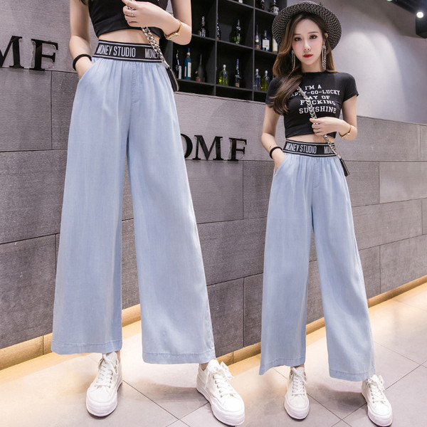 Pantaloni moderni de dama cu model lat de buzunare