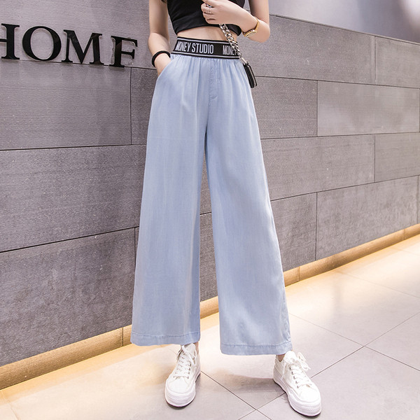 Pantaloni moderni de dama cu model lat de buzunare