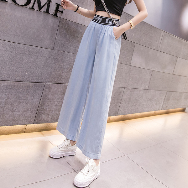 Pantaloni moderni de dama cu model lat de buzunare