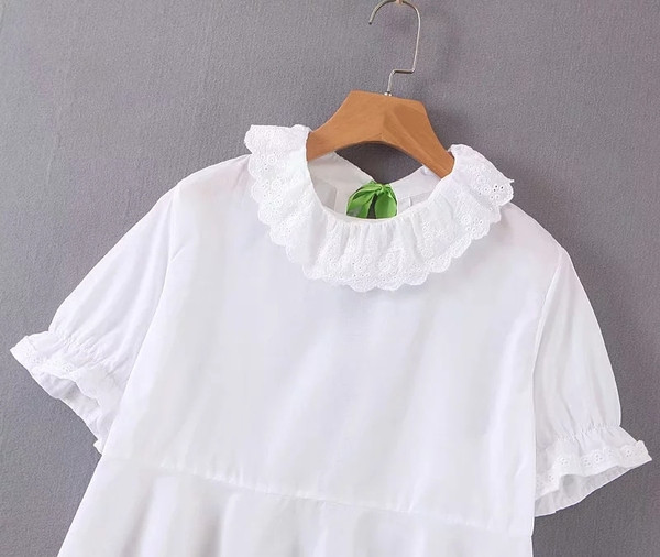 Cămașă elegantă de damă, cu spatele gol și mâneci scurte, în alb