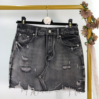 Fusta de dama din denim cu efect rupt in albastru si negru