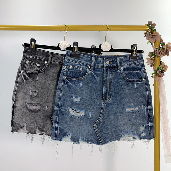 Fusta de dama din denim cu efect rupt in albastru si negru