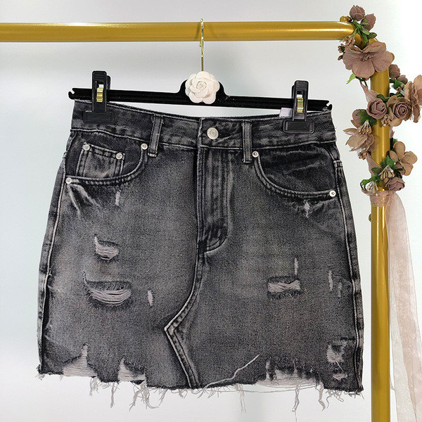 Fusta de dama din denim cu efect rupt in albastru si negru