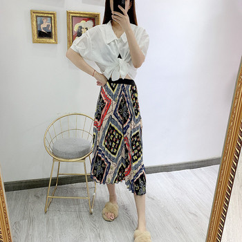 Fusta de dama plisata cu talie inalta si model