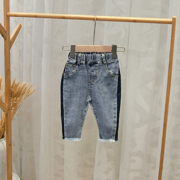 Blugi de copii eleganti pentru baieti cu motive rupte in albastru