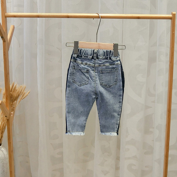 Blugi de copii eleganti pentru baieti cu motive rupte in albastru