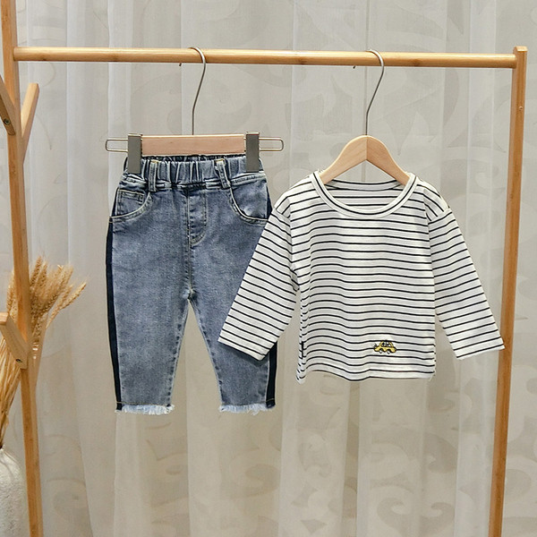 Blugi de copii eleganti pentru baieti cu motive rupte in albastru