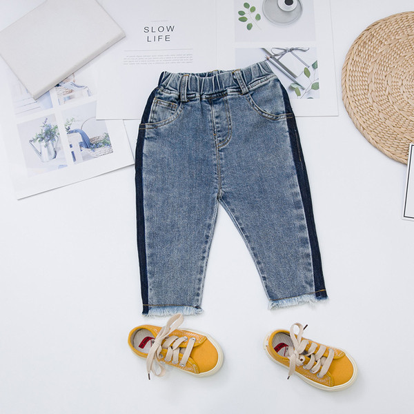 Blugi de copii eleganti pentru baieti cu motive rupte in albastru