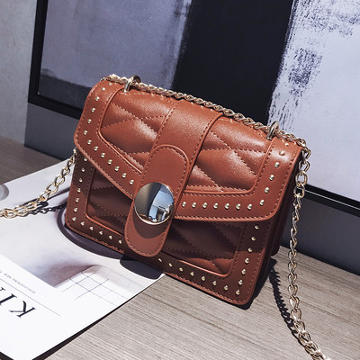 Geanta de dama cu maner metalic in patru culori