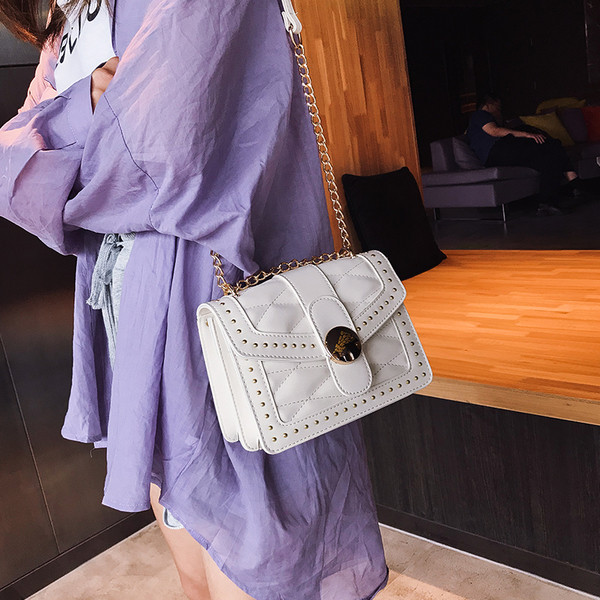 Geanta de dama cu maner metalic in patru culori