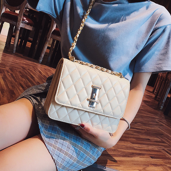 Geanta de dama eleganta cu inchidere metalica in trei culori