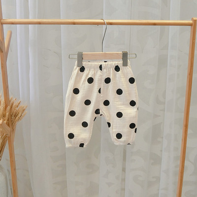 Pantaloni copii la modă cu buline în mai multe culori pentru fete