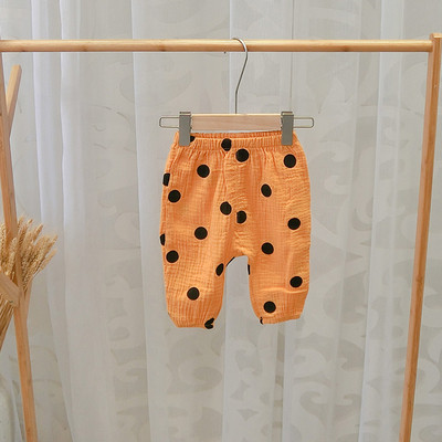 Pantaloni copii la modă cu buline în mai multe culori pentru fete