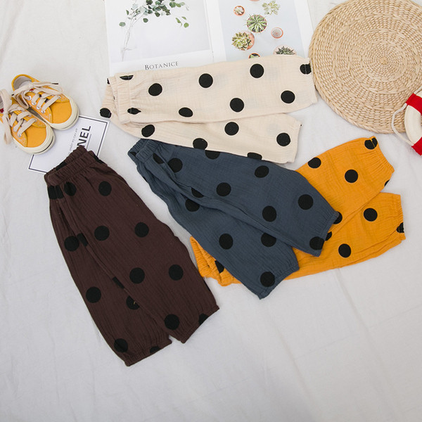 Pantaloni copii la modă cu buline în mai multe culori pentru fete