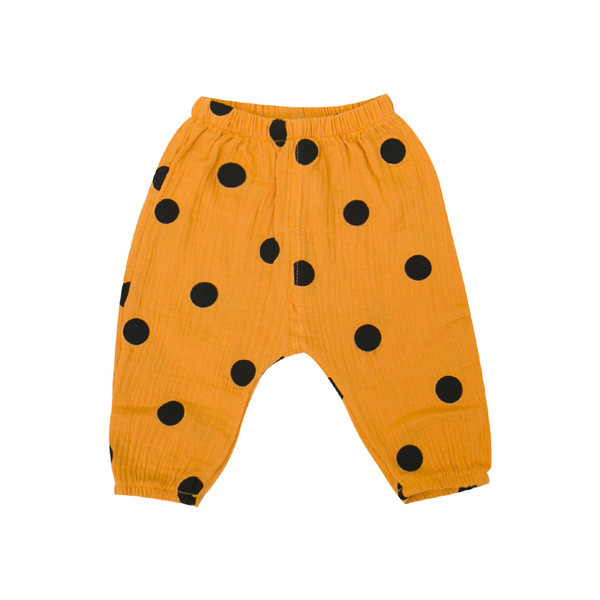 Pantaloni copii la modă cu buline în mai multe culori pentru fete