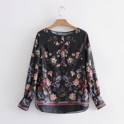 Bluză de damă din tul cu mâneci lungi și decolteu oval