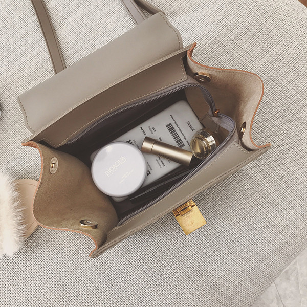 Geanta de dama moderna cu inchidere metalica