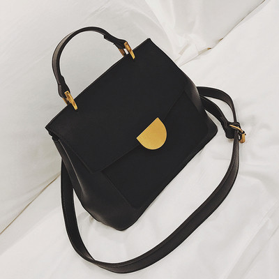 Geanta de dama cu inchidere metalica