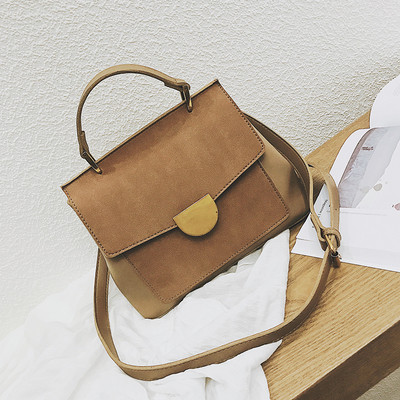 Geanta de dama cu inchidere metalica